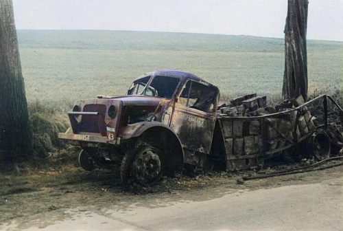 BEF burnt out bedford with petrol cans aos 43.jpg