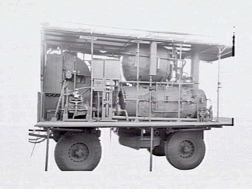 a38158 -1943 generator or boiler, set on four wheeled trailer.jpg