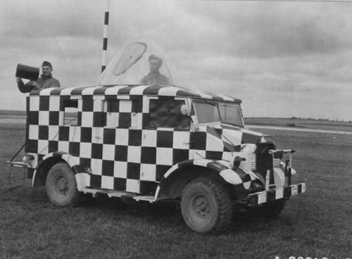 ACaravanControlTruckOnAnAirbaseInEngland17June1944_zpsb42cca44.jpg